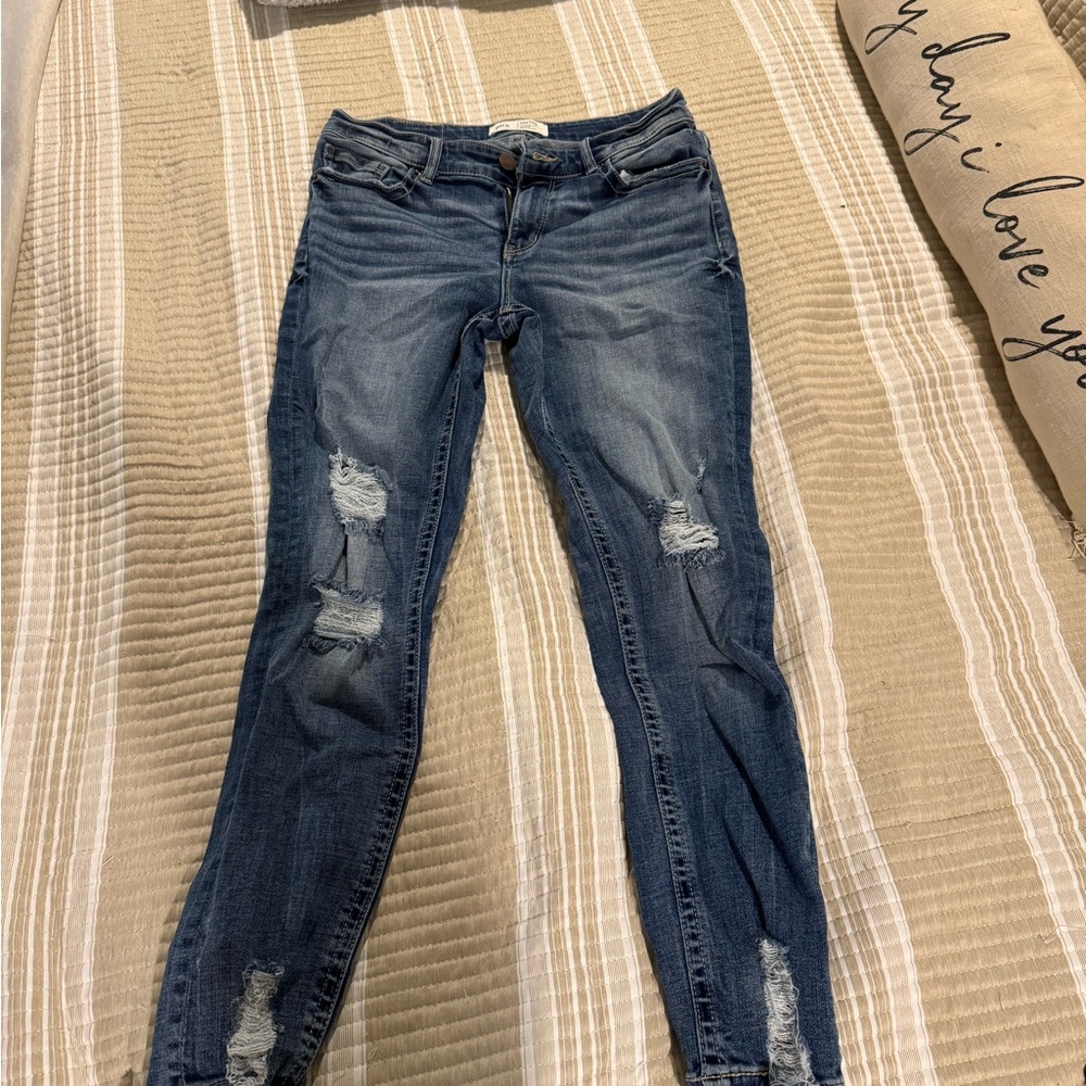 Women's Distressed Blue Jeans